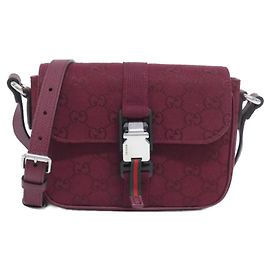Borsa a spalla Gucci in tela e pelle GG rossa