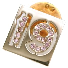 Spilla a spillo Chanel placcata in oro con strass No 19