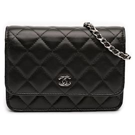 Portafoglio Mini CC in pelle di agnello nera di Chanel