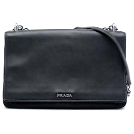 Borsa a tracolla Prada in Saffiano Lux nero e tessuto con catena