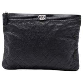 Clutch Chanel Boy O in Caviar Nero Medio Trapuntato