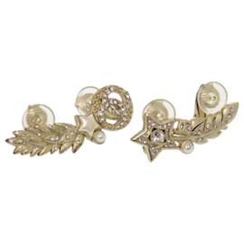 Orecchini a clip in piume a forma di stella con il logo Coco di Chanel