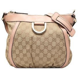 Sac à bandoulière Gucci en toile GG beige Abbey D Ring