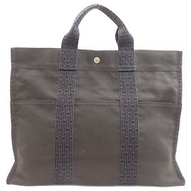 Bolso Hermès Herline MM en lona gris