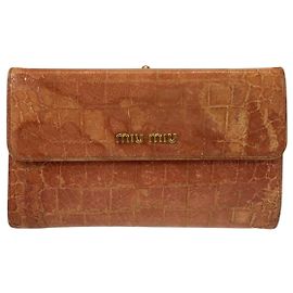 Portafoglio compatto in pelle goffrata Miu Miu