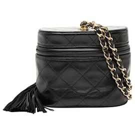 Beauty case in pelle di agnello trapuntata nera Chanel con catena e nappina