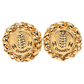Orecchini a clip in medaglione di grano placcati in oro CC dorato Chanel