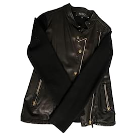Chaqueta Gucci de cuero negro con mangas de lana