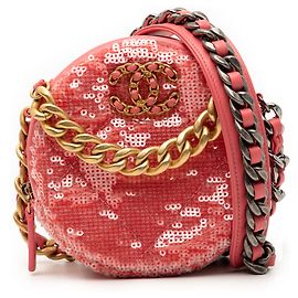 Clutch rotondo Chanel in agnello rosa con paillettes 19 con catena