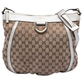 Borsa a tracolla Gucci in tela GG beige Abbey D Ring