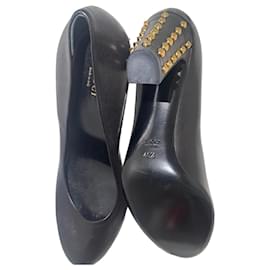 Gucci schwarze Leder High Heels mit goldenen Nieten