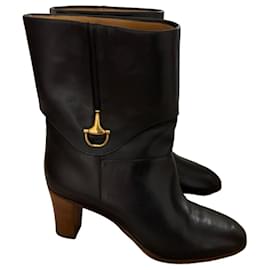 Schwarze Lederstiefel von Gucci