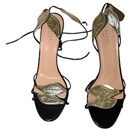 Gucci black and gold leather heeled sandals