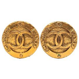 Orecchini rotondi a clip in oro placcato CC dorato di Chanel