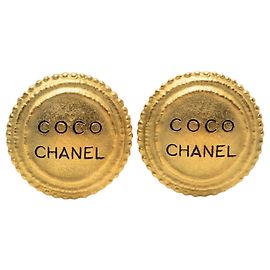 Orecchini a clip con bottone logo in oro placcato Chanel