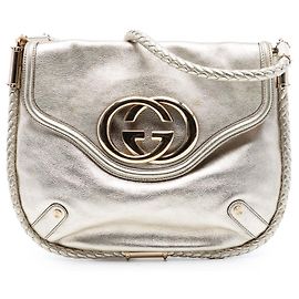 Borsa a spalla Gucci Britt in pelle di vitello metallica dorata media con frange.