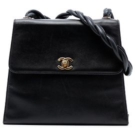 Borsa a spalla Chanel CC Caviar nera con tracolla intrecciata