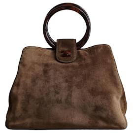 Borsa a mano in suede marrone con chiusura a girello CC in tartaruga vintage di Chanel