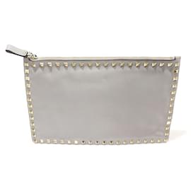 Pochette in pelle di vitello grigia con borchie dorate Rockstud - Valentino