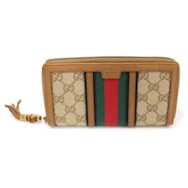 Cartera larga con cremallera Rania en bambú con jacquard de logo GG y borlas WEB - Gucci