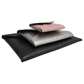 Louis Vuitton Set di Clutch Kirigami Epi
