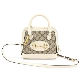 Gucci Bolso mini de piel blanca GG Supreme con detalle de estribo