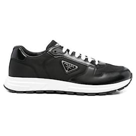 Sneakers in Nylon e Pelle - Prada