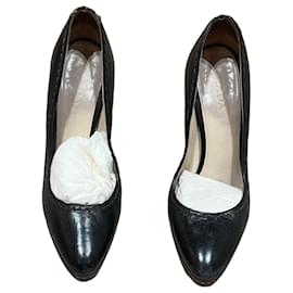 Scarpe con tacco Prada in pelle nera con piattaforma Taglia 38