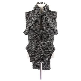 Top sin mangas de tweed bicolor Alexander McQueen Negro