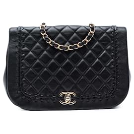 Bolso de solapa trenzado de piel de cordero acolchado negro Chanel