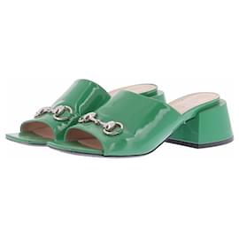 Mules Gucci in pelle verde