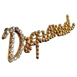 "Dream" Brosche aus goldfarbenem Metall mit Strass - Dsquared2