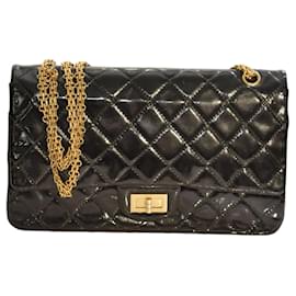 Borsa Maxi Flap 228 in pelle verniciata trapuntata nera 2.55 rieditata di Chanel