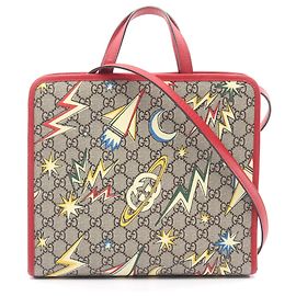 Borsa Gucci beige per bambini con stampa spaziale GG Supreme