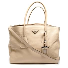 Borsa tote in pelle beige a due manici Prada