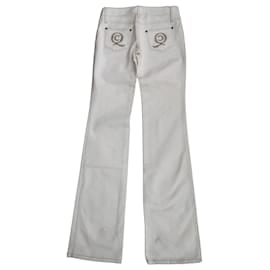 Vaqueros acampanados Alexander McQueen cristales Swarovski blancos