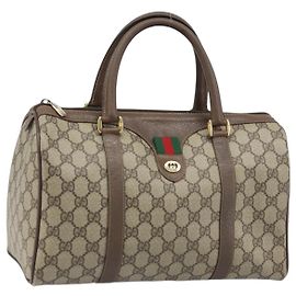 Bolso Boston de PVC beige y dorado de la línea Sherry GG Supreme de GUCCI 40 02 007 Auth ARZ492