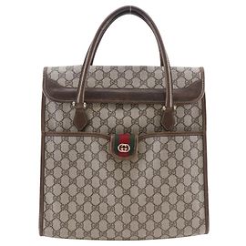 Borsa a mano in PVC GG intrecciato Gucci