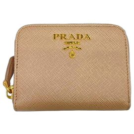 Portamonete rotondo con zip Prada in rosa beige