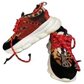 Baskets Versace en cuir noir et rouge