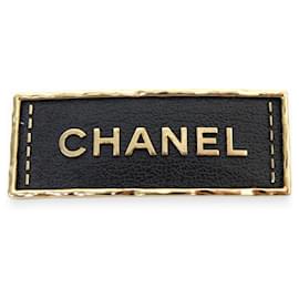 NUEVO BROCHE CHANEL PLACA LOGO CUERO METAL DORADO