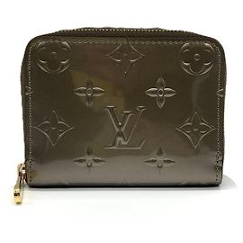 Monedero Zippy de Louis Vuitton en Oro Champán