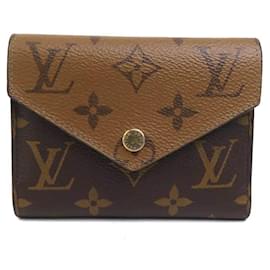 Louis Vuitton Monogram Reverse Tri-fold Geldbörse