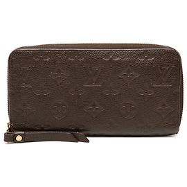 Cartera Zippy Monogram Empreinte Marrón Louis Vuitton