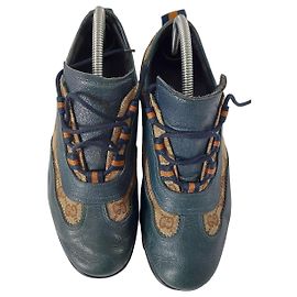 Scarpe da ginnastica Gucci in pelle verde scuro e tela monogram