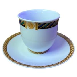 Christian Dior coffee cups and plates (x2)