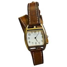 Montre Hermès avec bracelet en cuir marron