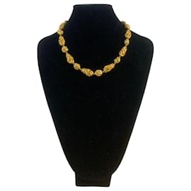 Collier long en perles dorées filigranées Coco Chanel par Goossen - Autre Marque