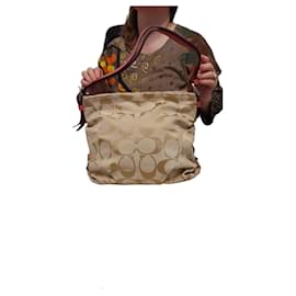 Borsa Coach in tela monogram beige e pelle rosa