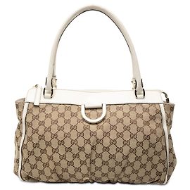 Bolso Tote Abbey D Ring en lona GG beige de Gucci